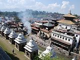 
Kathmandu’s Pashupatinath temple complex is the holiest Hindu site outside India. Pashupati is one of the many names of Shiva, the most revered god in the Hindu pantheon, this one meaning the Lord of the Animals. Supposedly Shiva needed a holiday from Mount Kailash and chose the Kathmandu valley. Non-Hindus are not allowed to enter the temple. Below the Pashupatinath temple runs the Bagmati River, a holy river that eventually joins the Ganges. Pilgrims throw the holy water onto themselves, while a few hearty Hindus bathe fully.
